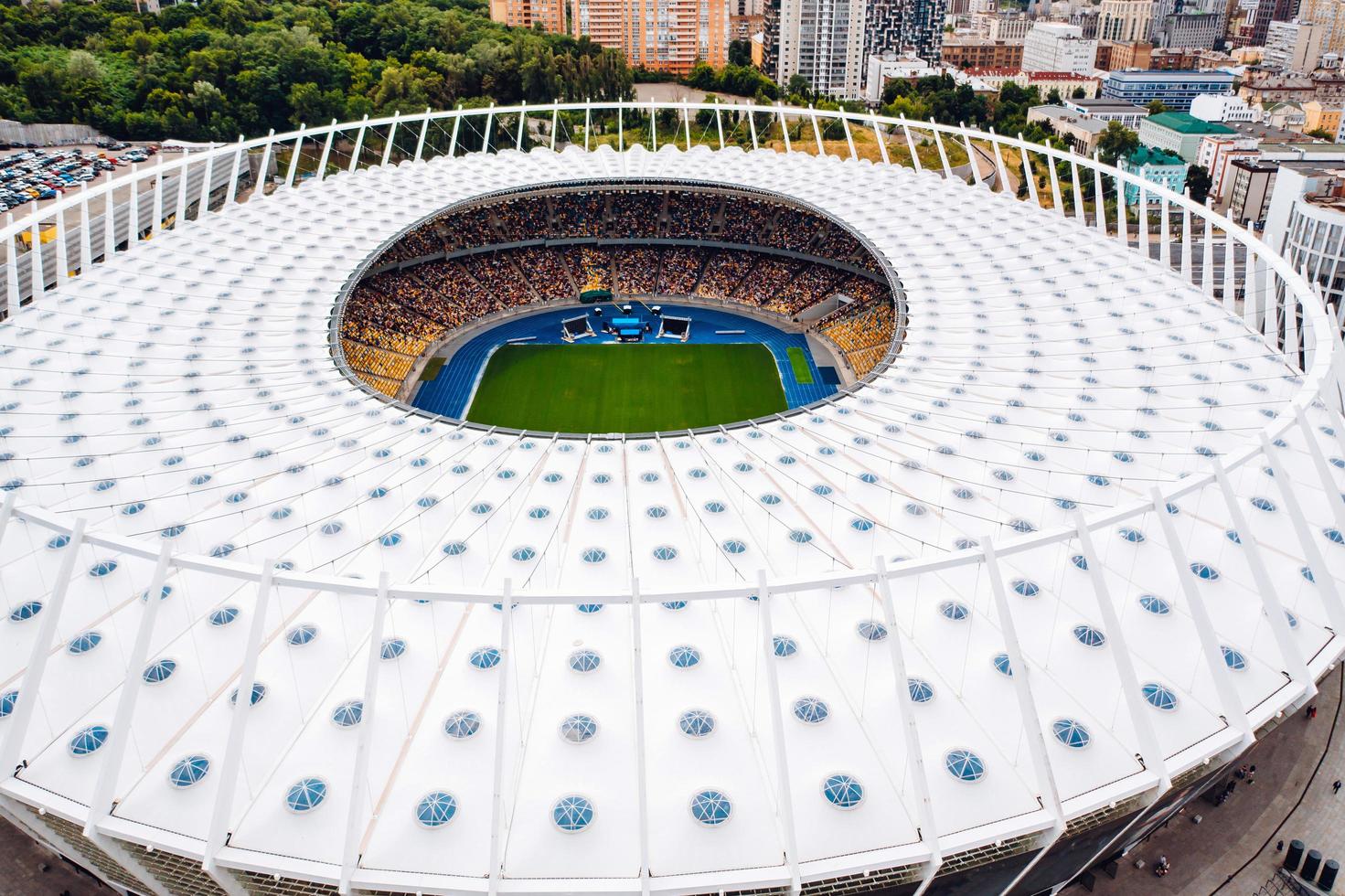 KIEV, UKRAINE JULY 30, 2019 Aerial view of the Olympic Stadium and Kiev city. photo