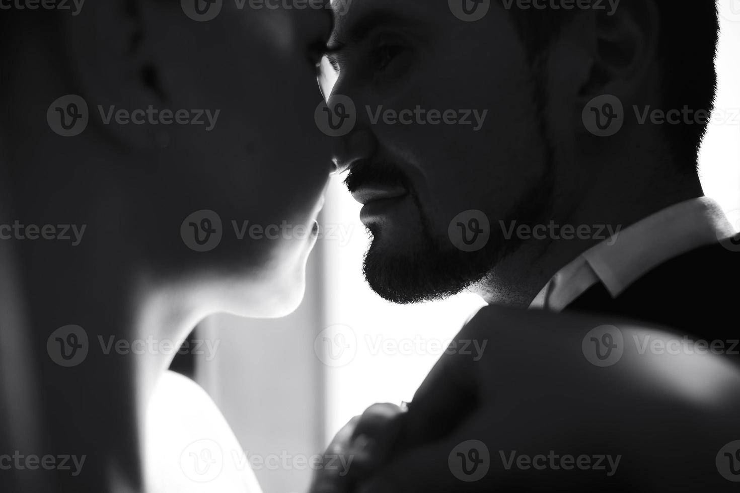 wedding couple standing close to each other photo