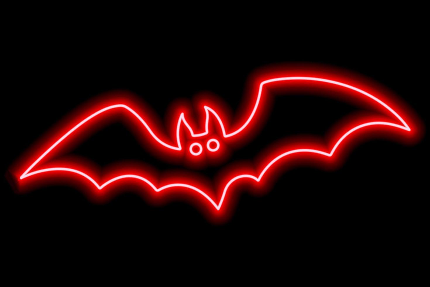 Neon red outline of a bat on a black background. Halloween concept. vector