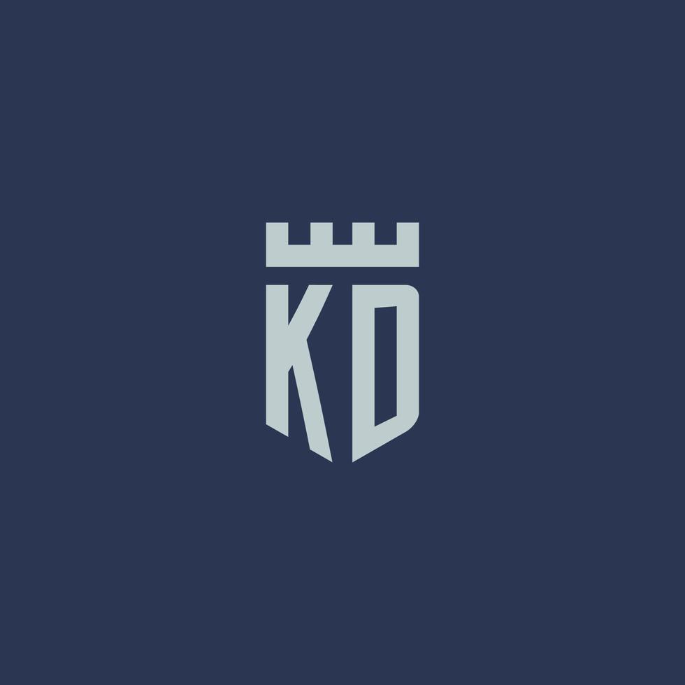 monograma del logotipo de kd con castillo de fortaleza y diseño de estilo de escudo vector