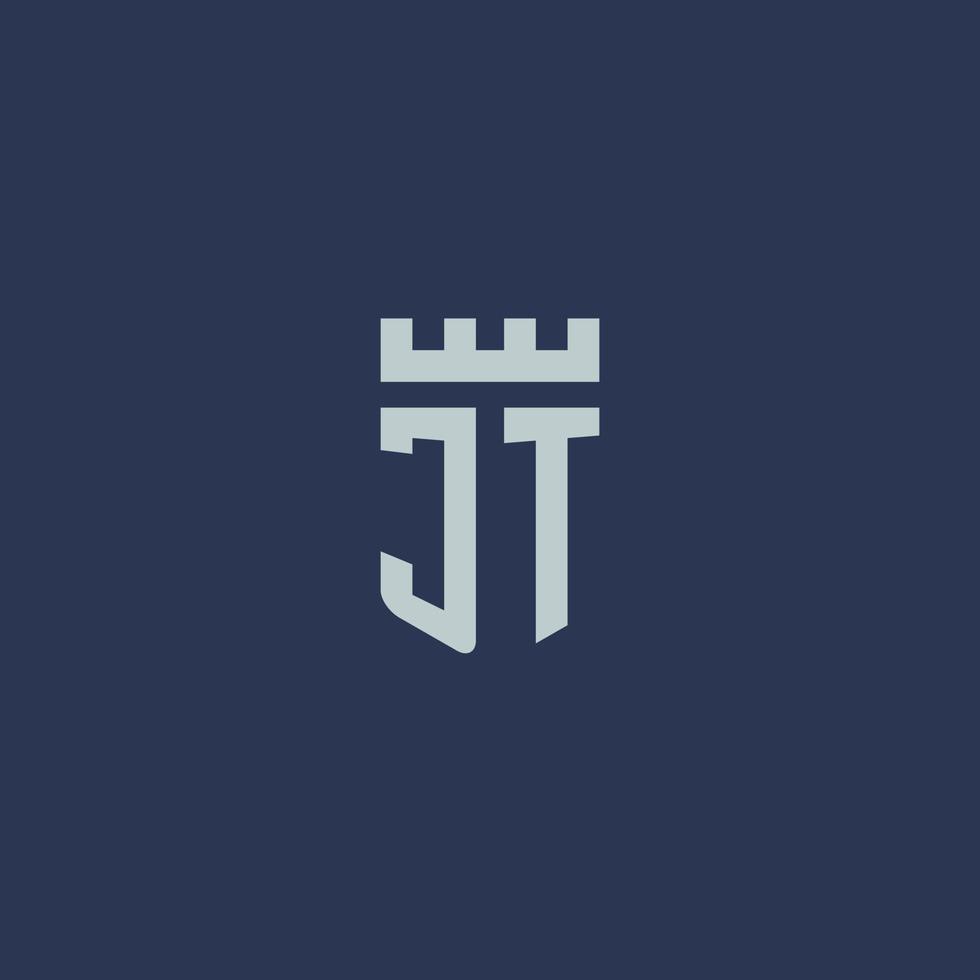 monograma del logotipo jt con castillo de fortaleza y diseño de estilo escudo vector