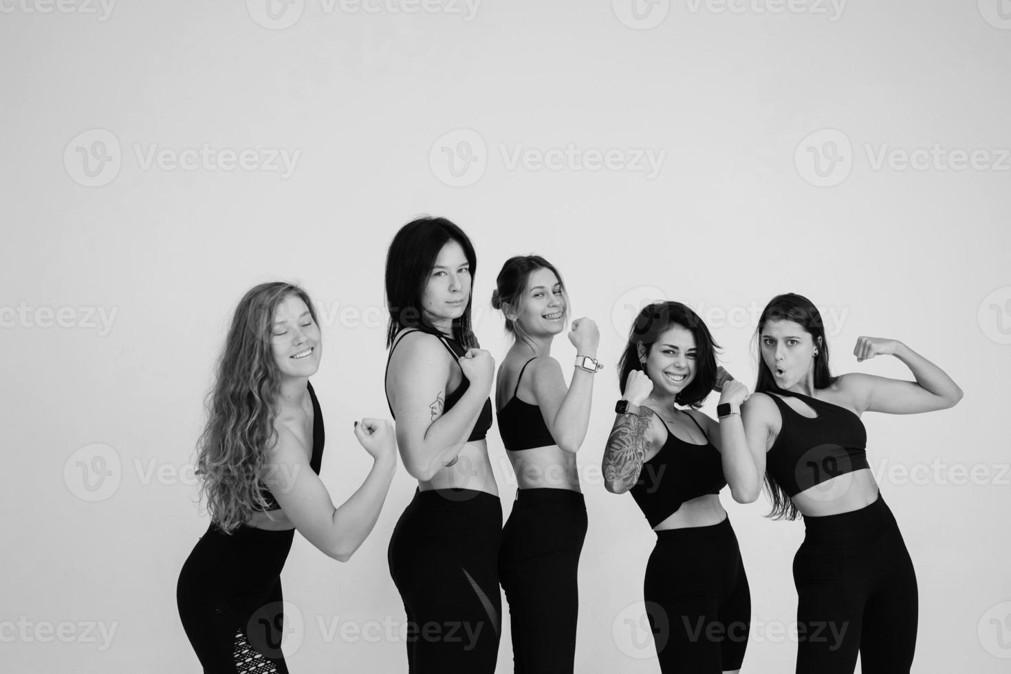 diverse models laughing, enjoying time together, look at camera photo