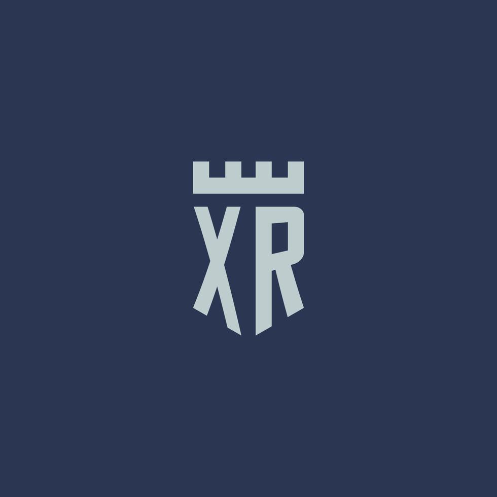 XR logo monogram with fortress castle and shield style design vector