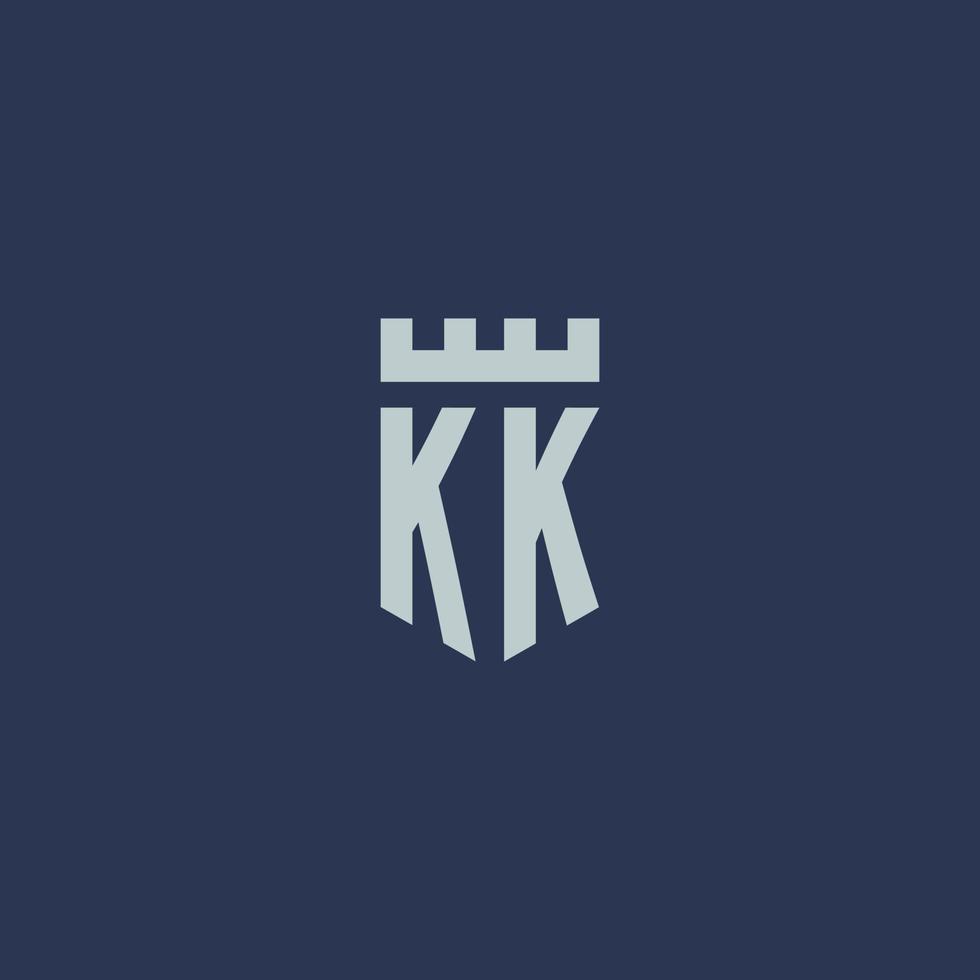 monograma del logotipo kk con castillo de fortaleza y diseño de estilo escudo vector