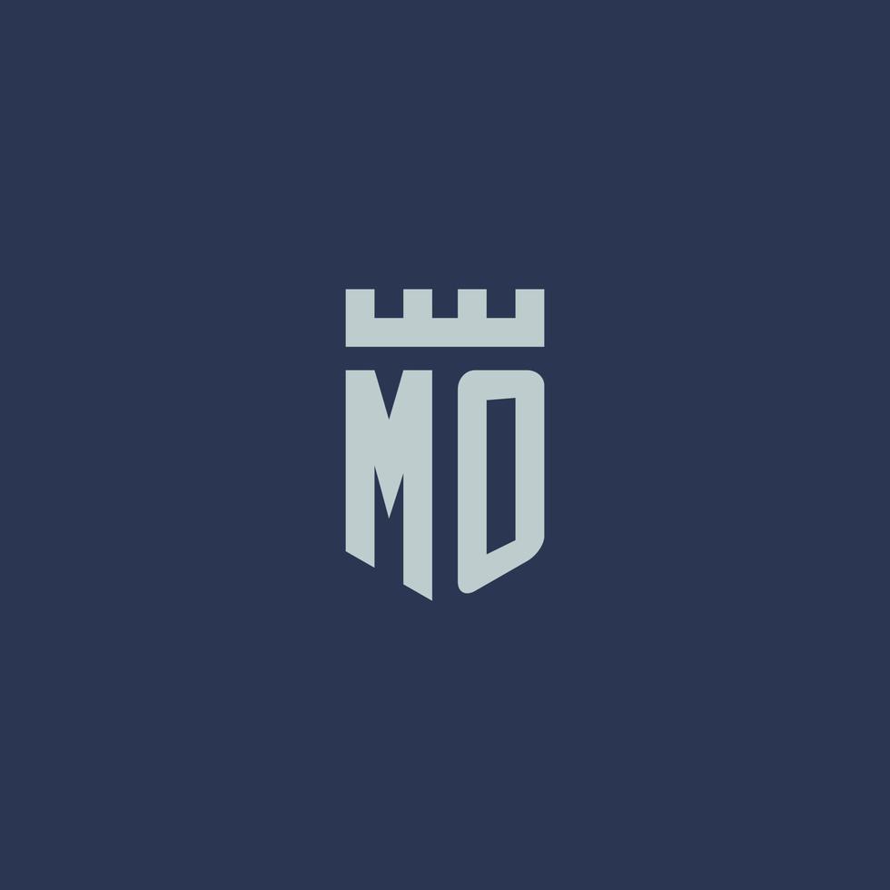 MO logo monogram with fortress castle and shield style design vector