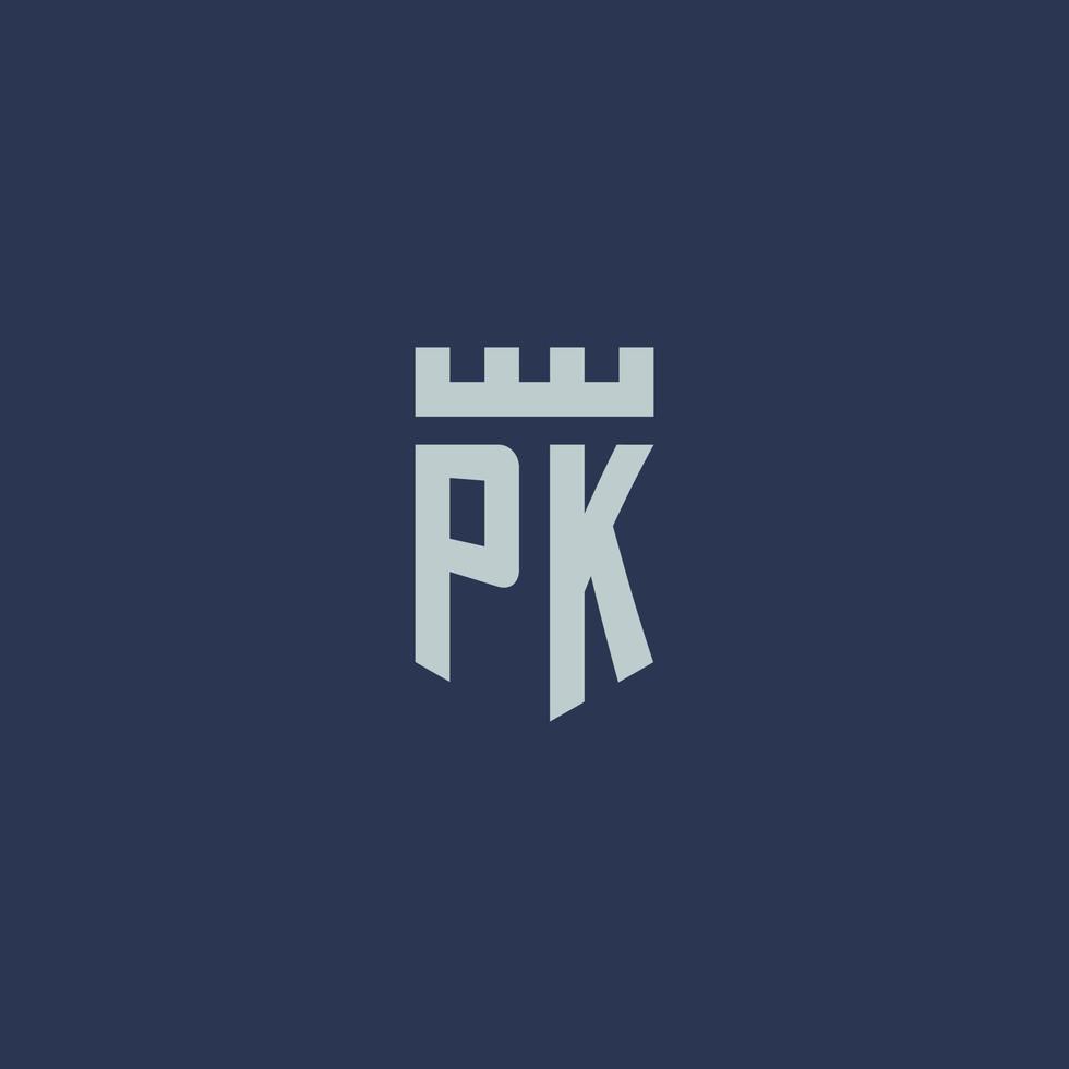 monograma del logotipo pk con castillo fortaleza y diseño de estilo escudo vector