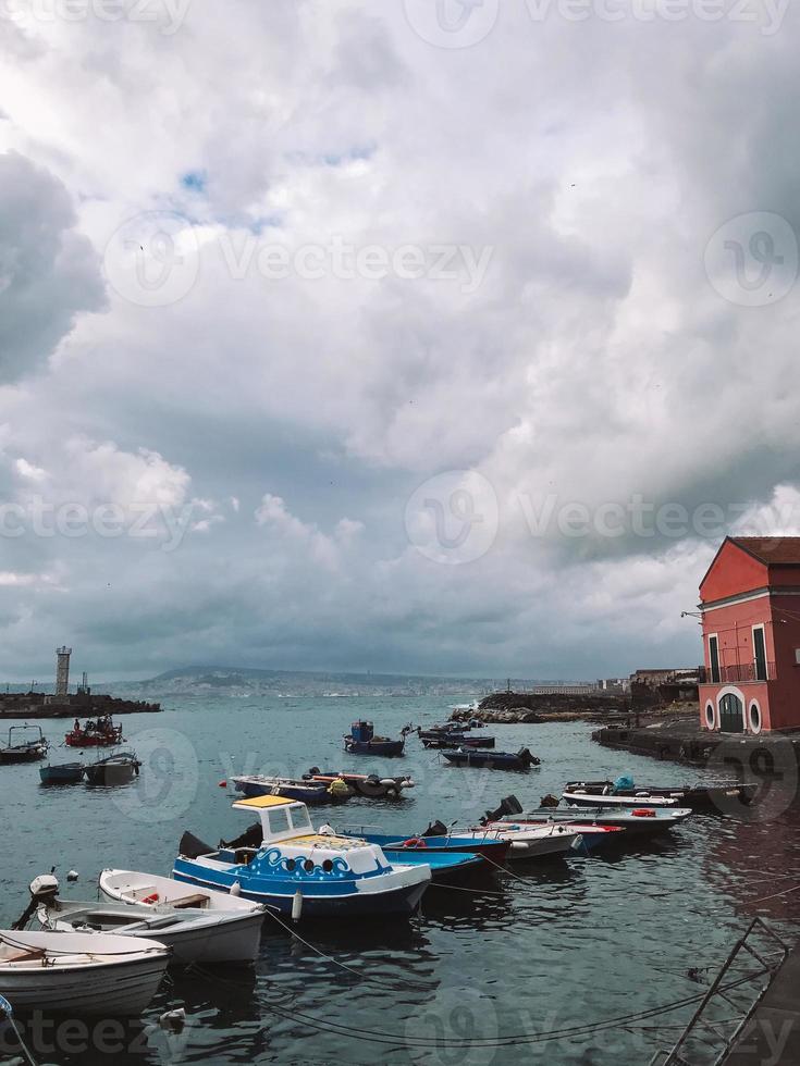 Small boats in harbor photo