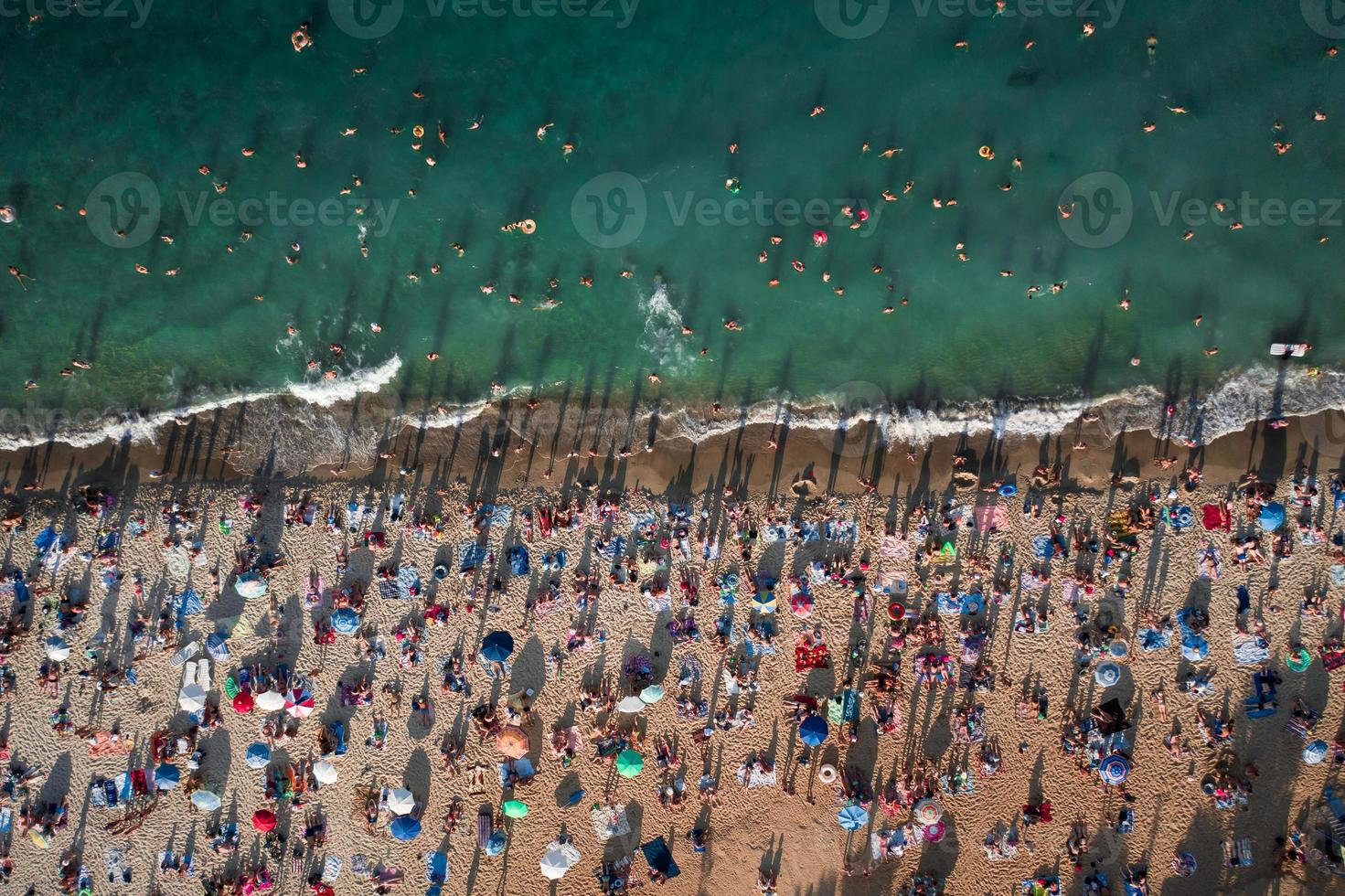 Aerial View of Crowd of People on the Beach photo