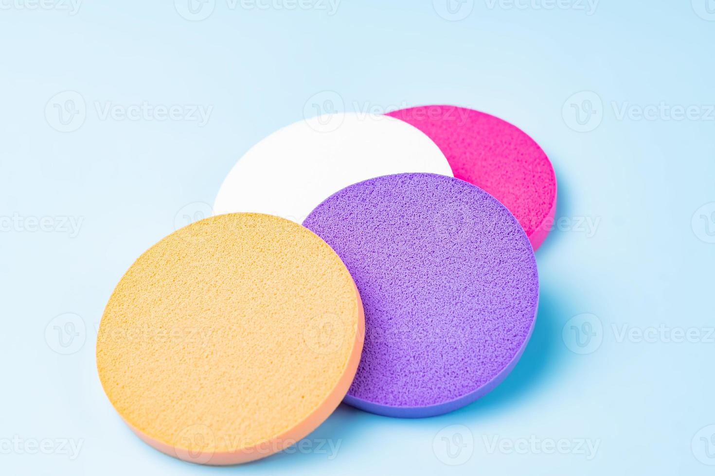Colorful cosmetic makeup applicator sponge set on blue background. 11467740 Stock Photo at Vecteezy