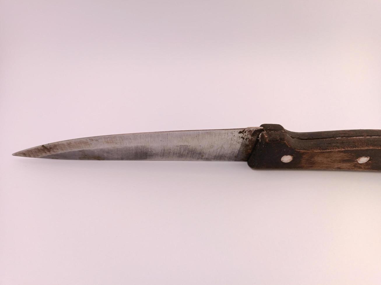 A knife with classic handle made from wood photo