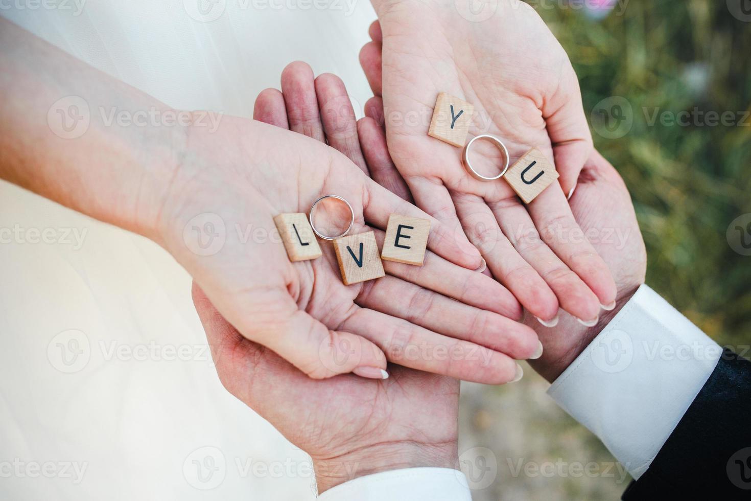 Cute message Love you in hands . photo