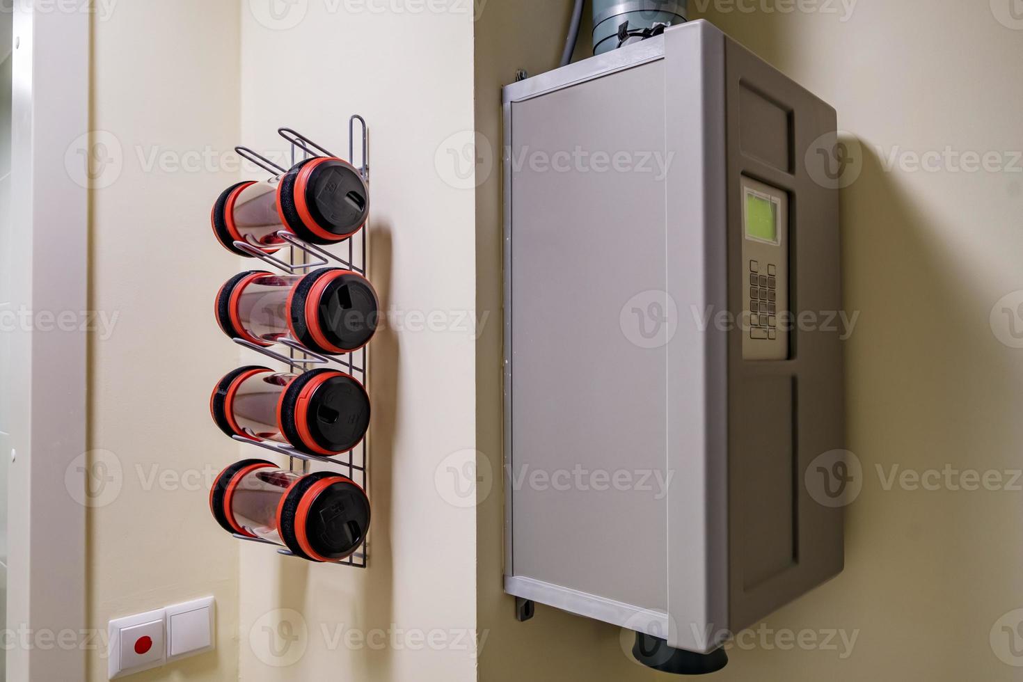 rows of empty pneumatic tubes of transfer system station in modern clinic, designed for fast operational transfer of analyzes, drugs and documents through air tunnels photo