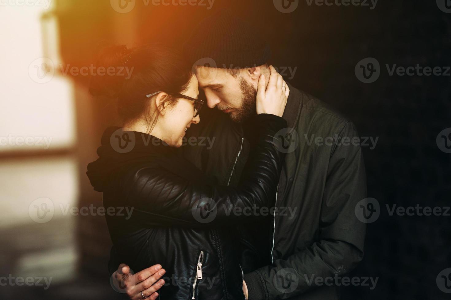 couple posing in backstreet photo