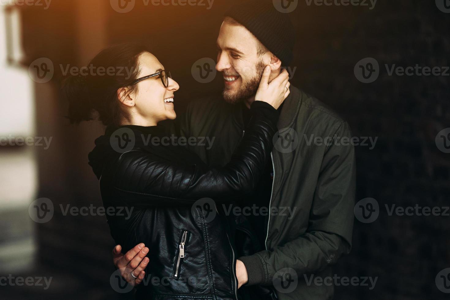 couple posing in backstreet photo