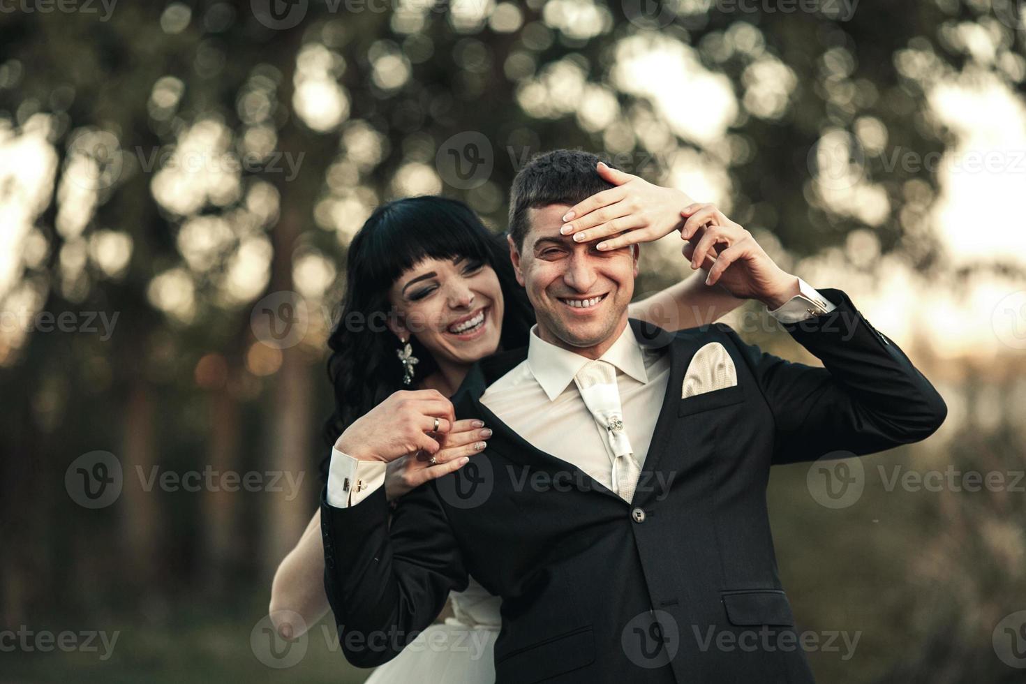 Lovely couple spends time in the field photo