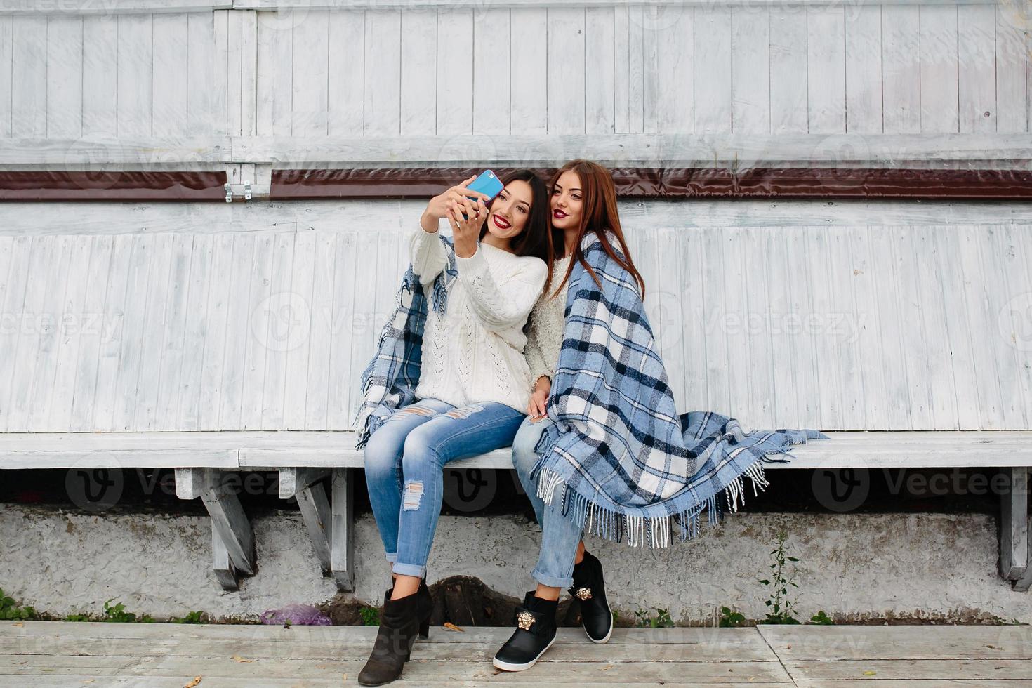 Two girls make selfie photo