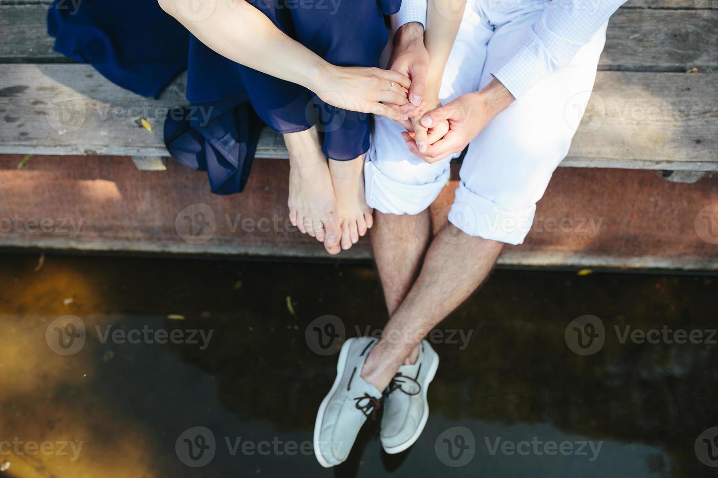 man and woman at the lake photo