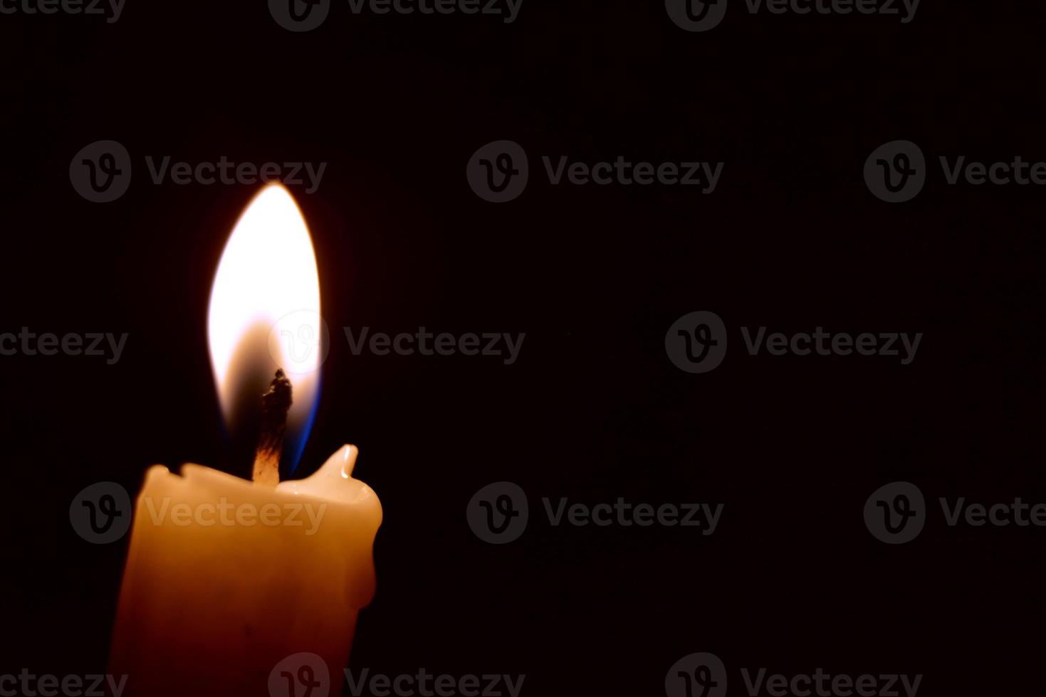 Candle flame on black background 11486958 Stock Photo at Vecteezy
