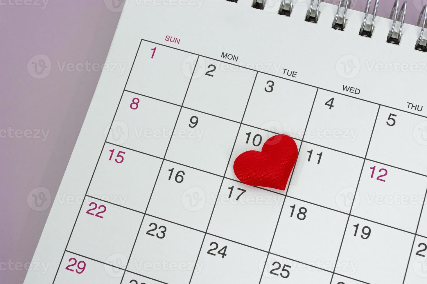 Red heart shape on the date of the 10th day in the calendar. photo