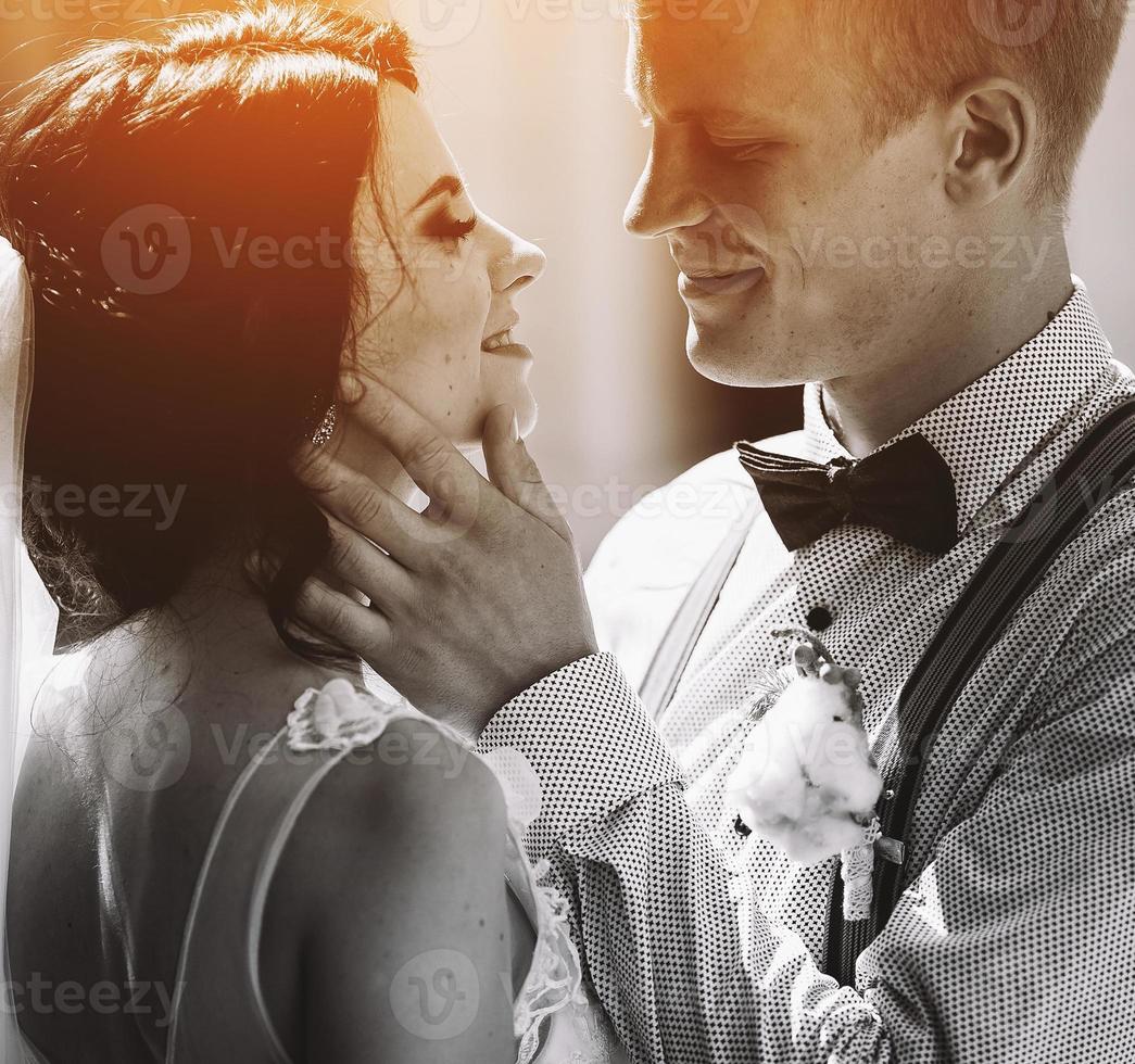 The bride and groom posing photo