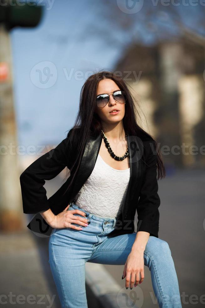 beautiful girl on the background of the road photo