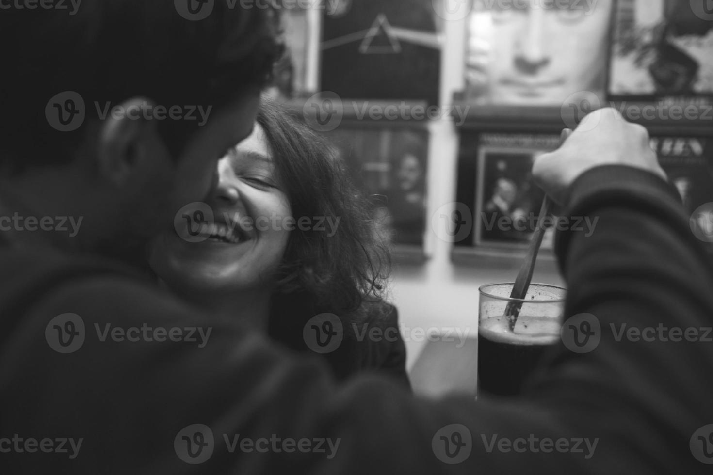 Vintage couple preparing coffee with vacuum coffee maker.Coffee shop photo