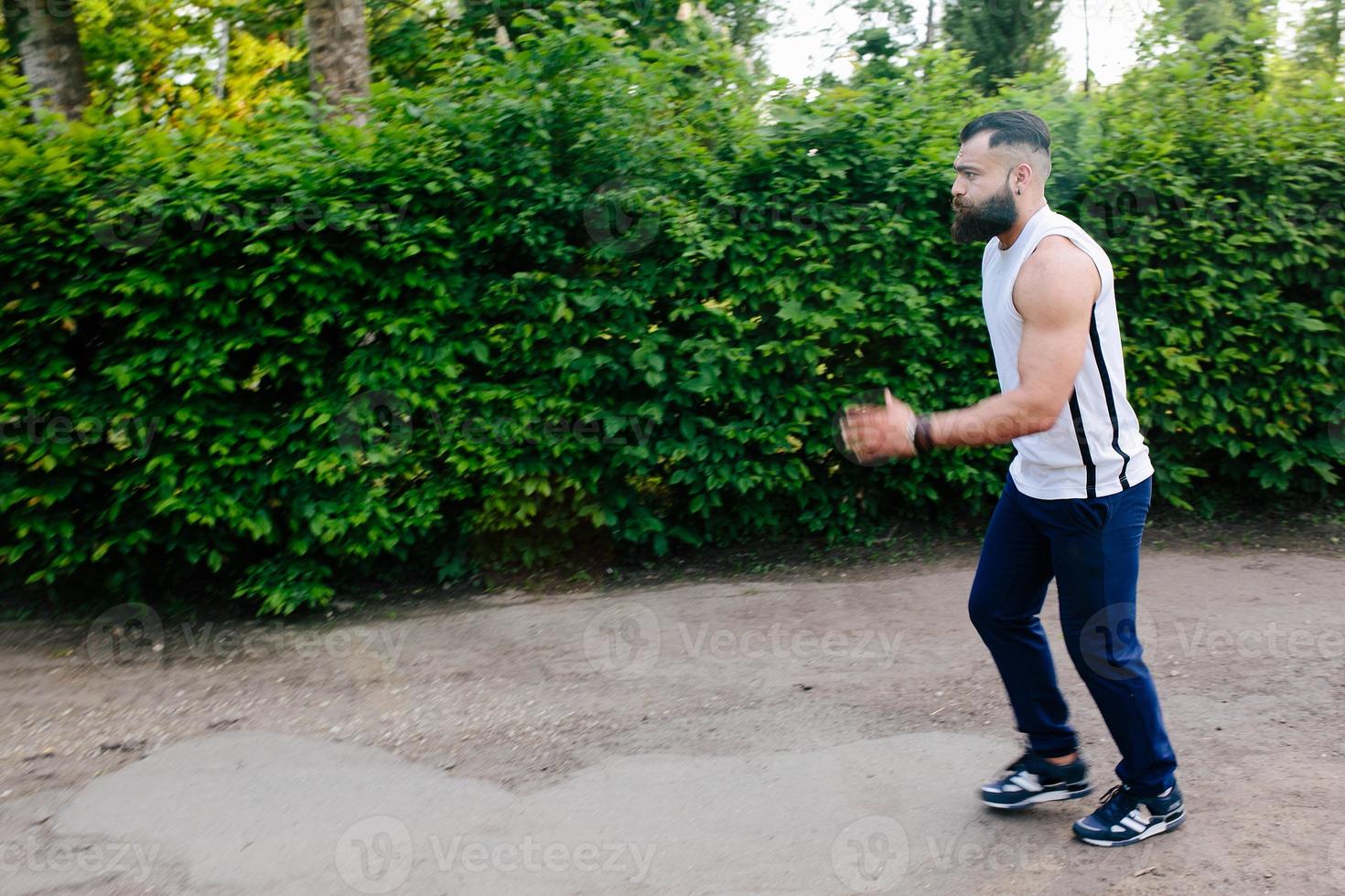 bearded man runs photo