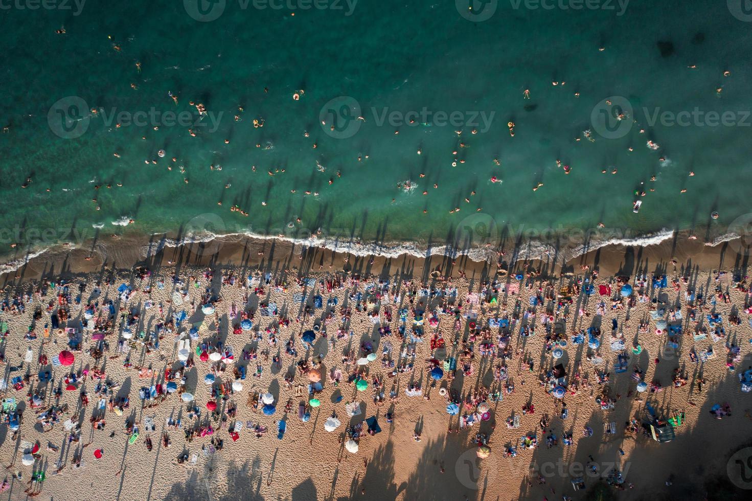 Aerial View of Crowd of People on the Beach photo