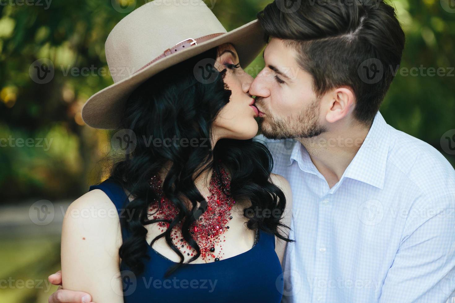 man embracing his girlfriend photo