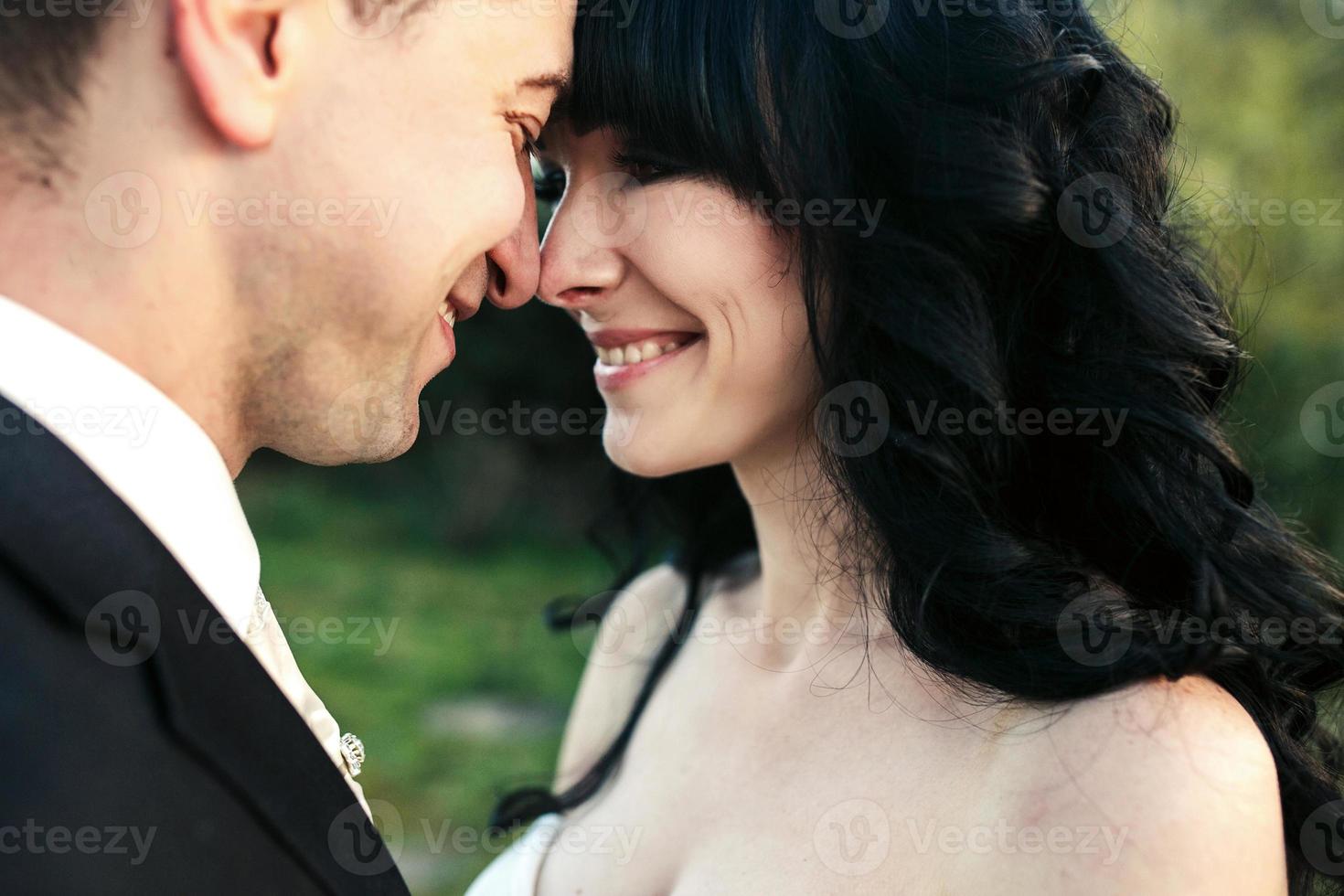 Lovely couple spends time in the field photo