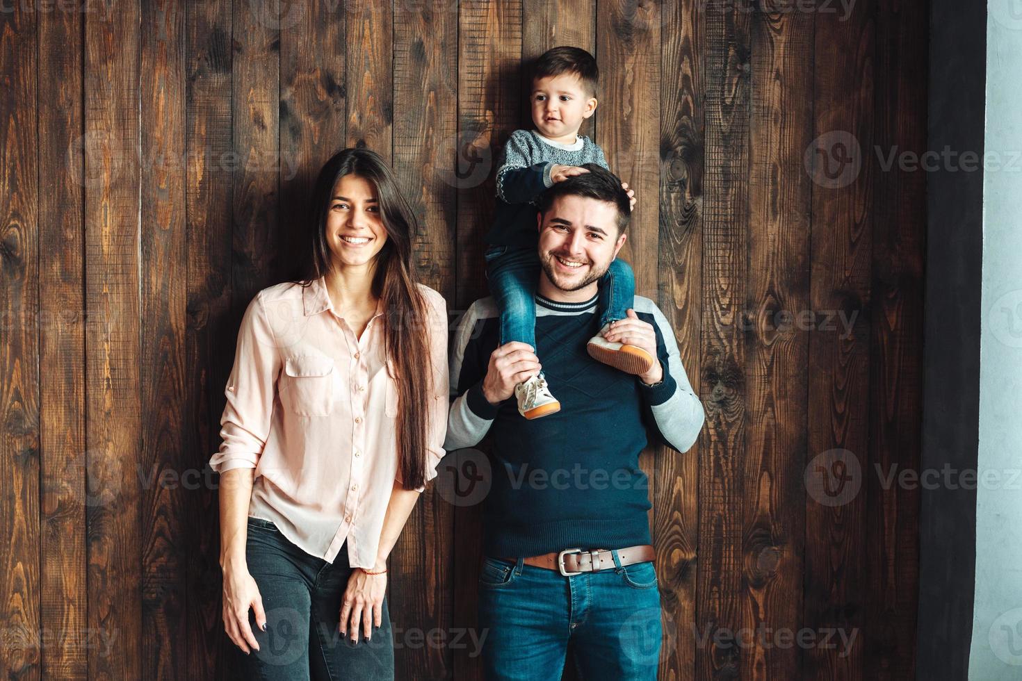 young family having fun at home photo