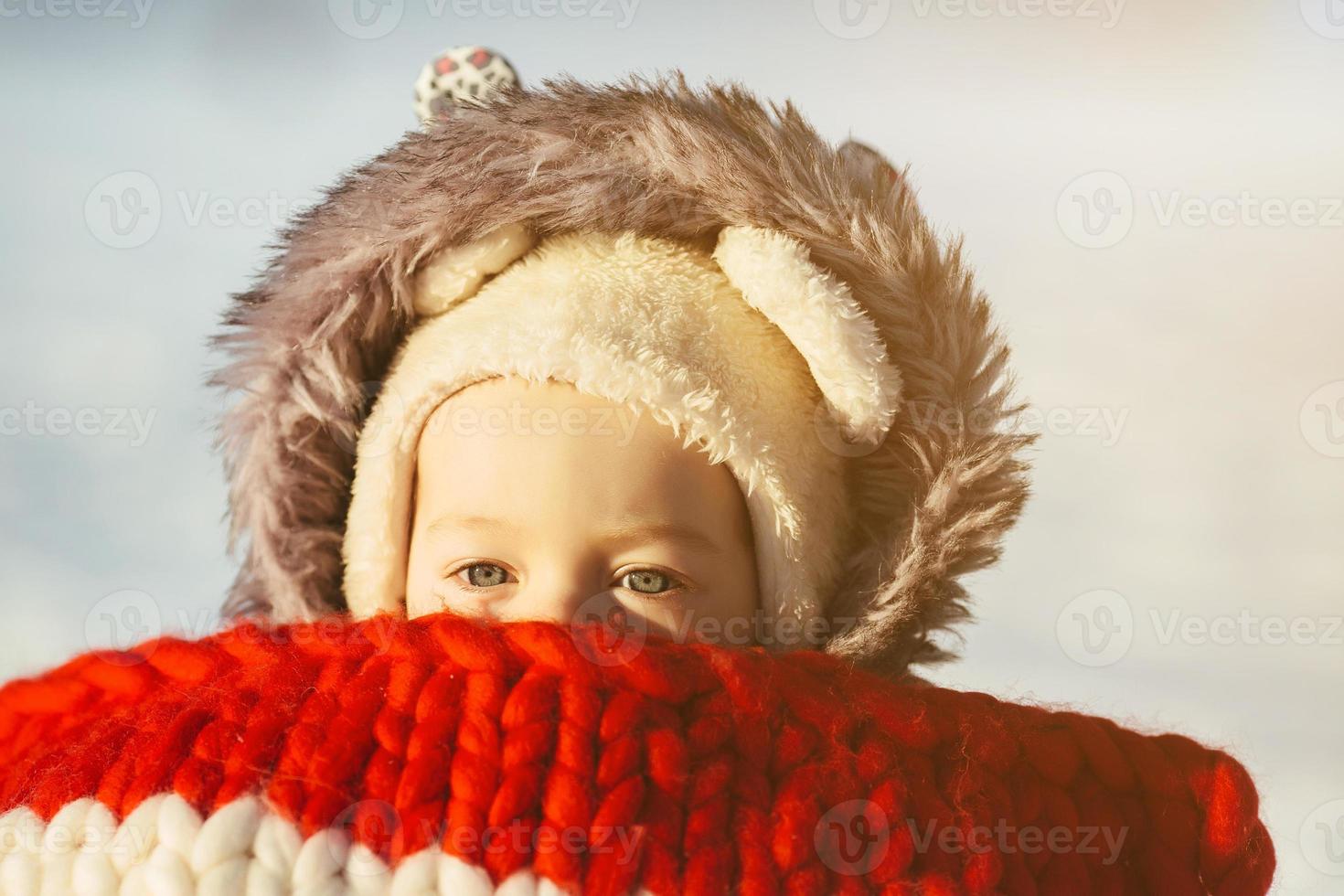 Little girl child sitting on sledges photo