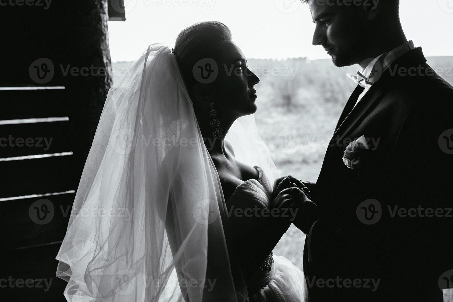 Photo of beautiful couple on nature in wooden hut