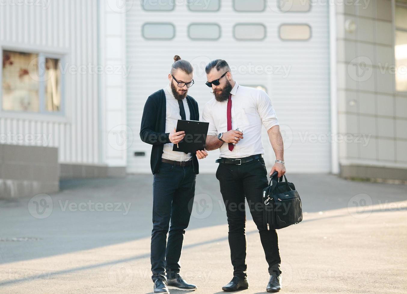 Two businessman at work photo