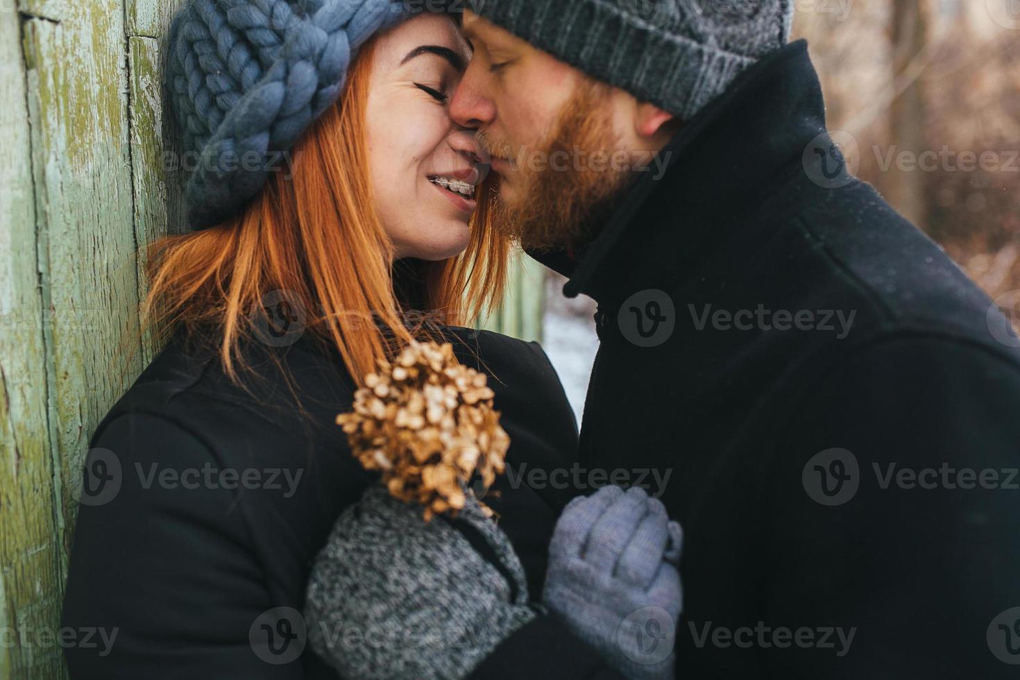 man and woman in tender embrace photo