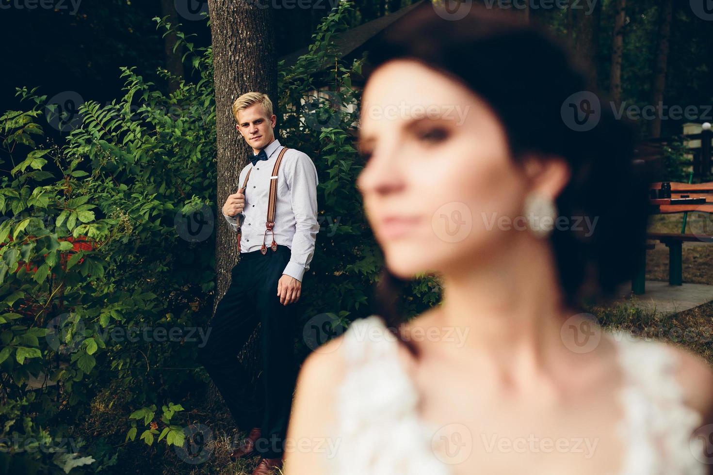 bride looks somewhere photo