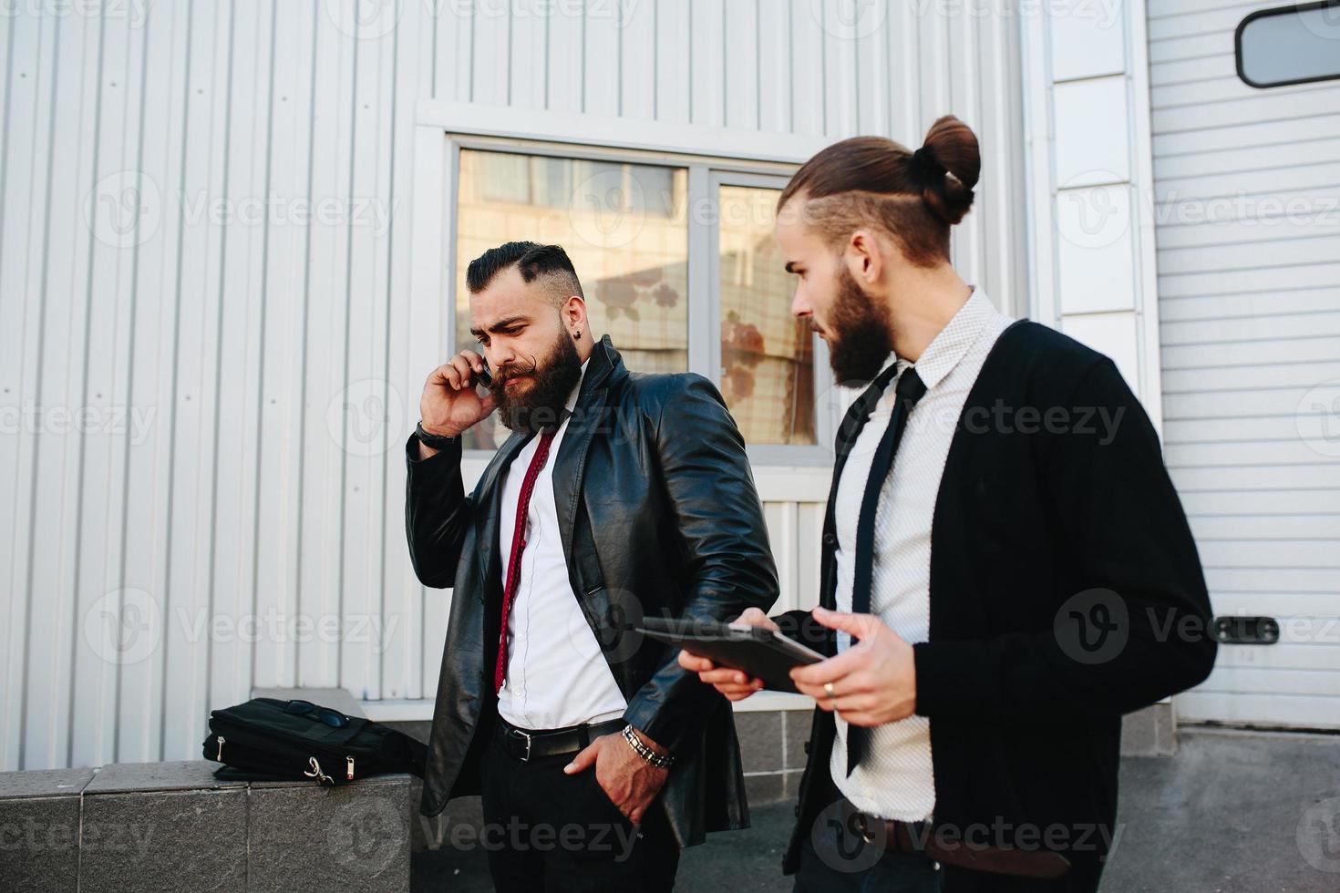 Two businessman at work photo