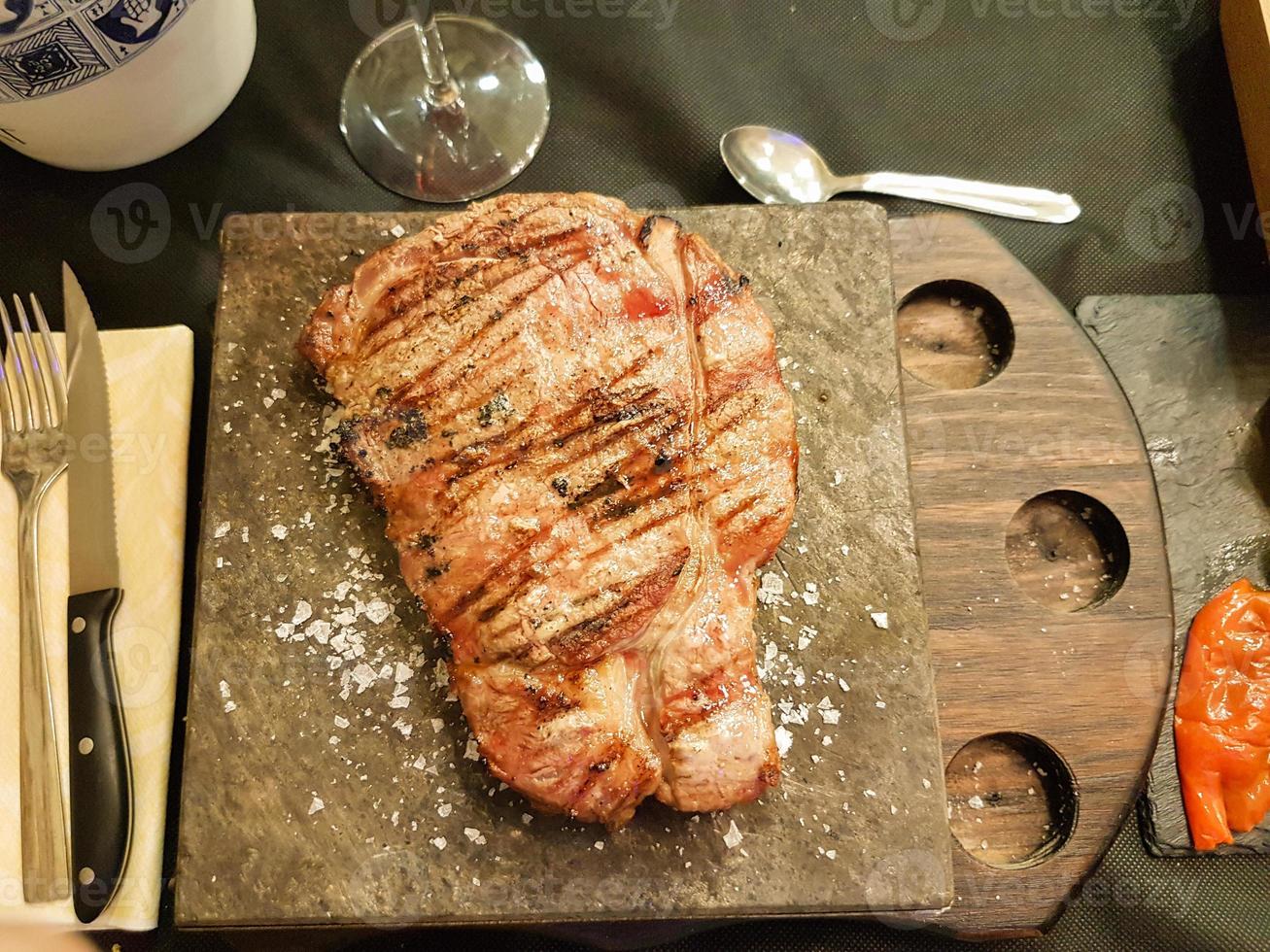 grilled entrecote with garnish photo