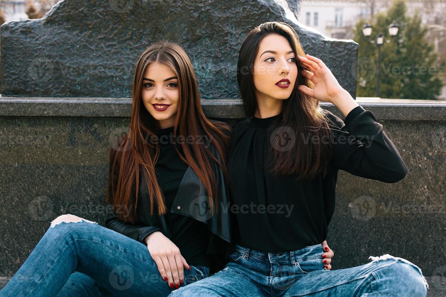 Two young adult girls photo