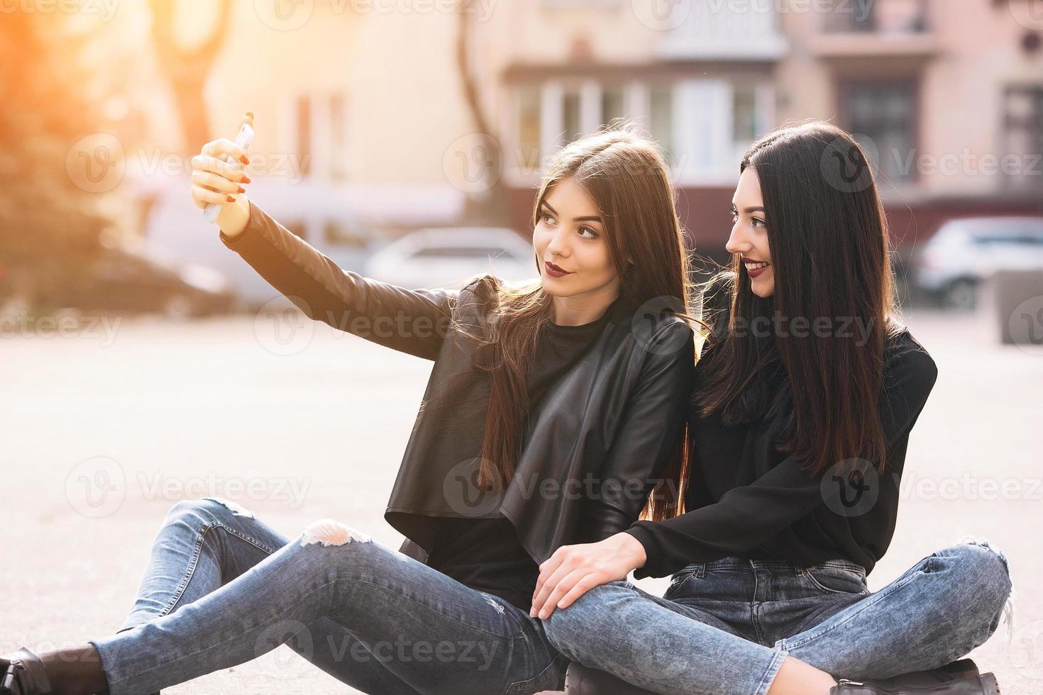 Two young adult girls photo