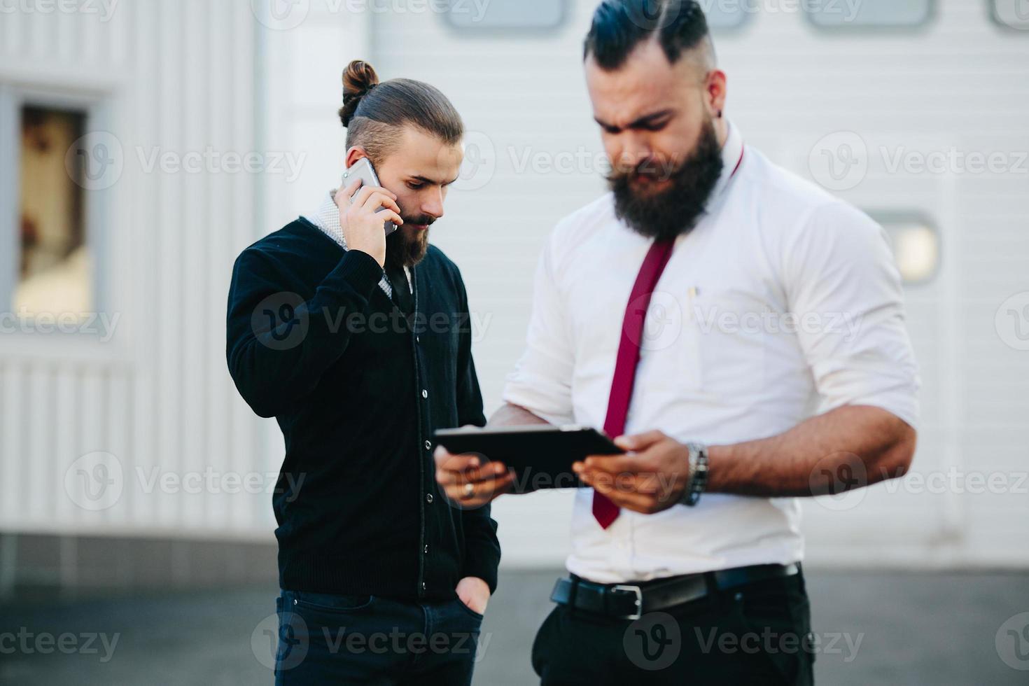 Two businessman at work photo