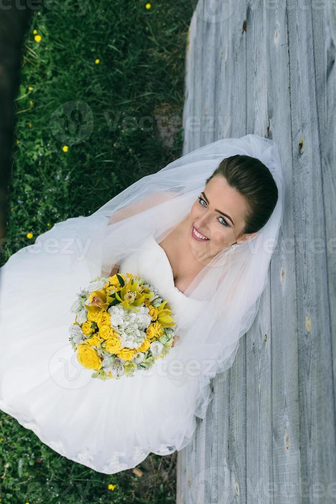 young beautiful Bride standing photo