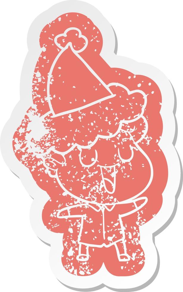 laughing cartoon distressed sticker of a man wearing santa hat vector