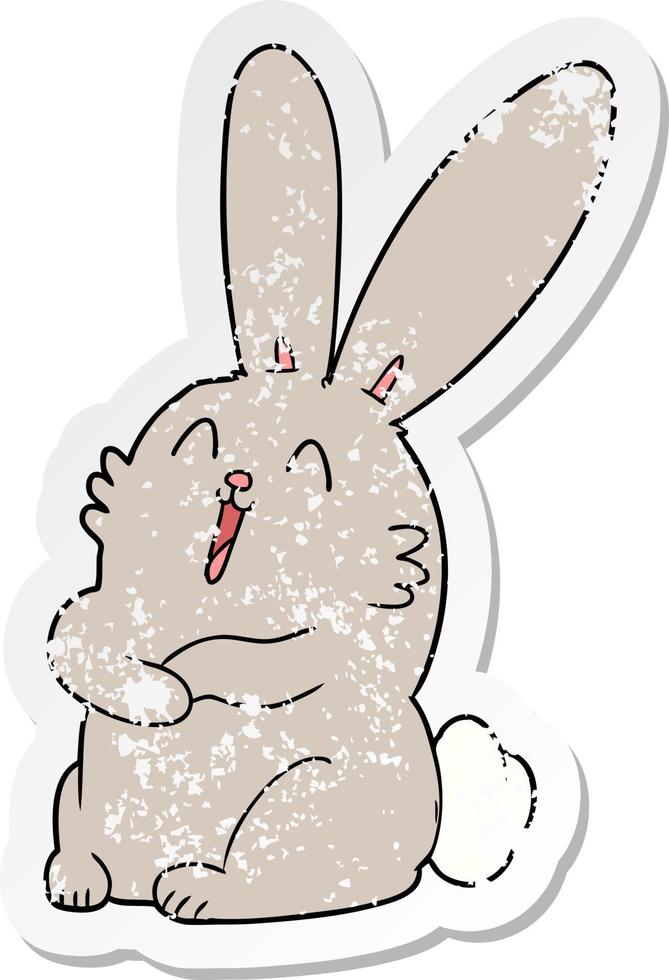 distressed sticker of a cartoon laughing bunny rabbit vector