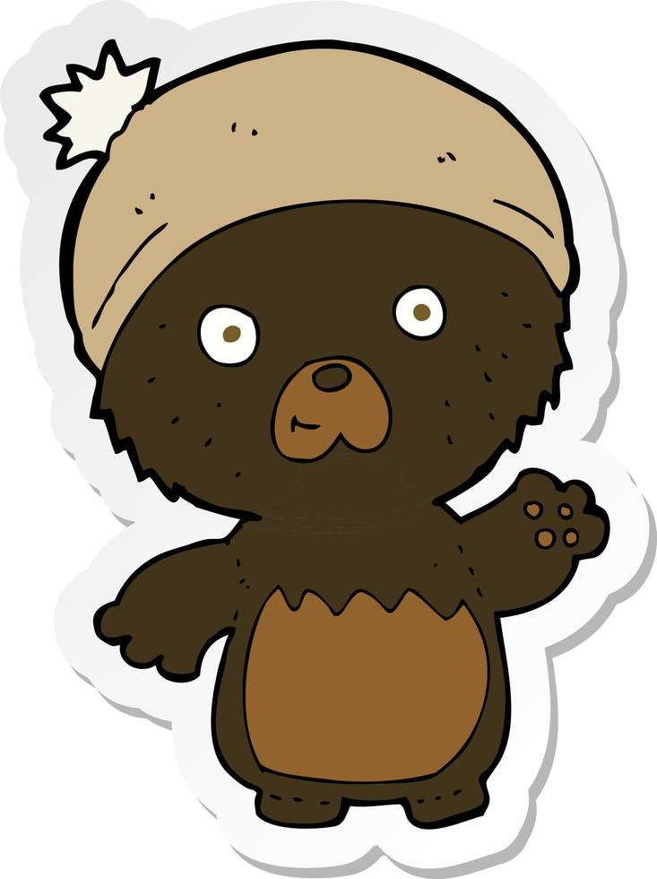 sticker of a cartoon cute teddy bear in hat vector