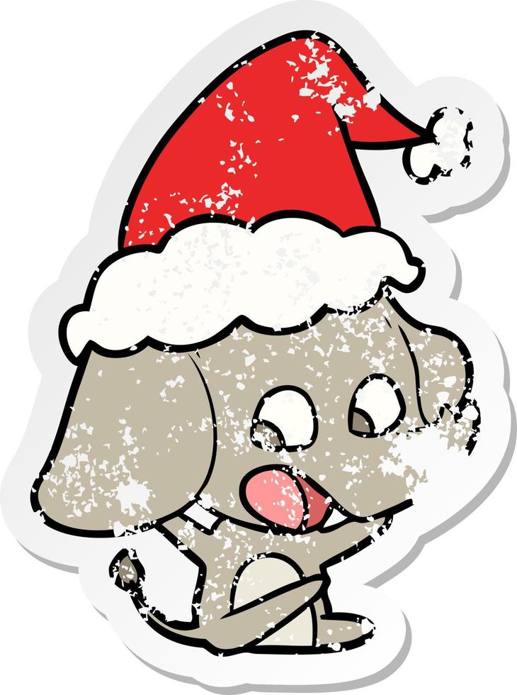 cute distressed sticker cartoon of a elephant wearing santa hat vector