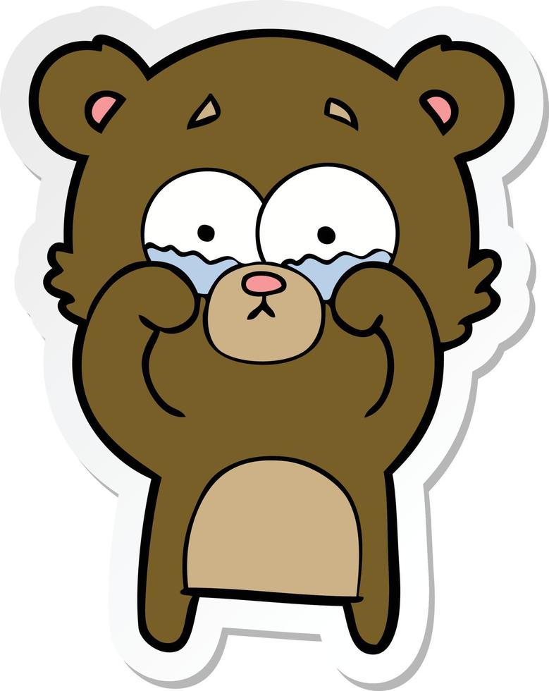 sticker of a cartoon crying bear rubbing eyes vector