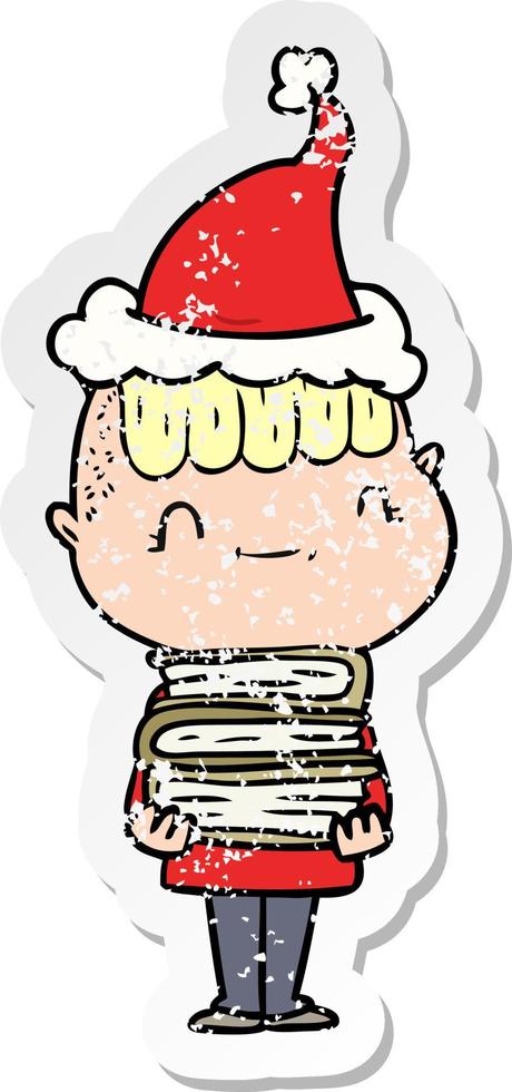 distressed sticker cartoon of a friendly boy with books wearing santa hat vector