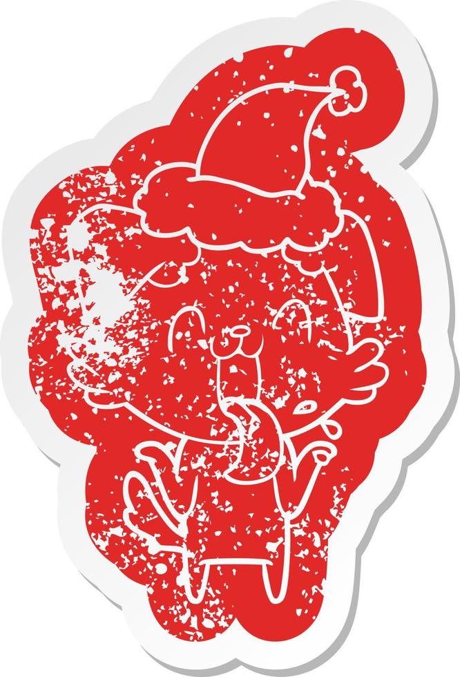 cartoon distressed sticker of a panting dog shrugging shoulders wearing santa hat vector