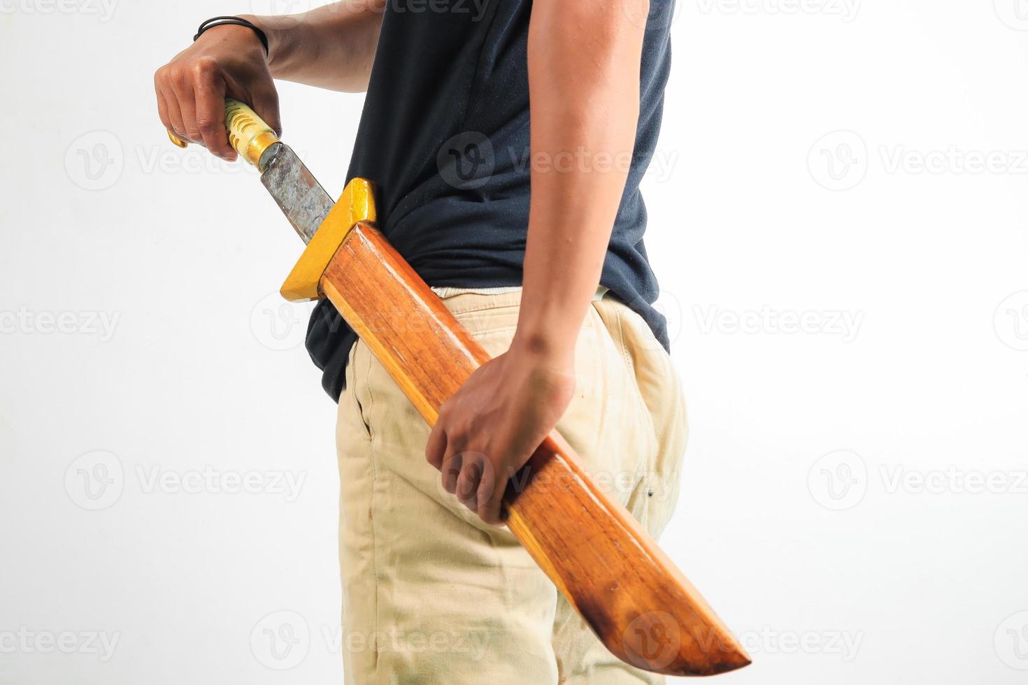 Man holding machete isolated photo